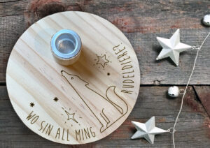 Weihnachtskerze mit Weihnachtsgrüßen op kölsch